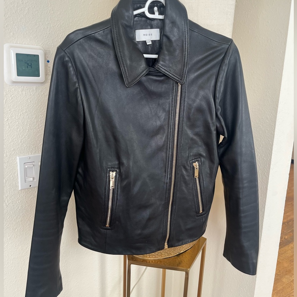 Reiss black leather jacket with gold zips! 🏍️